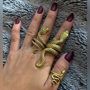 Snake ring set - 3 gold rings, all except the one on my thumb are adjustable